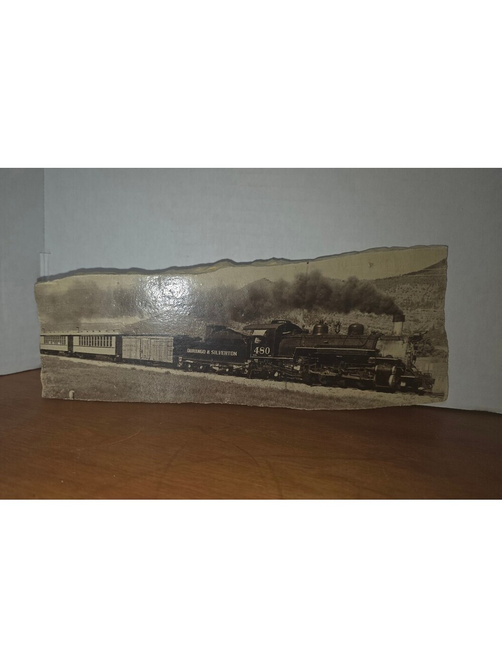 Art. Stone image of vintage train photo. Collectors piece